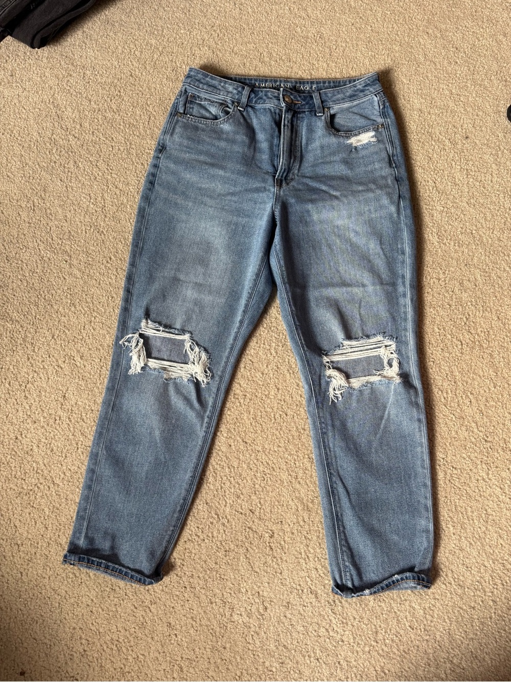 Blue Ripped High-Rise Distressed Mom Jean. Women's Jeans